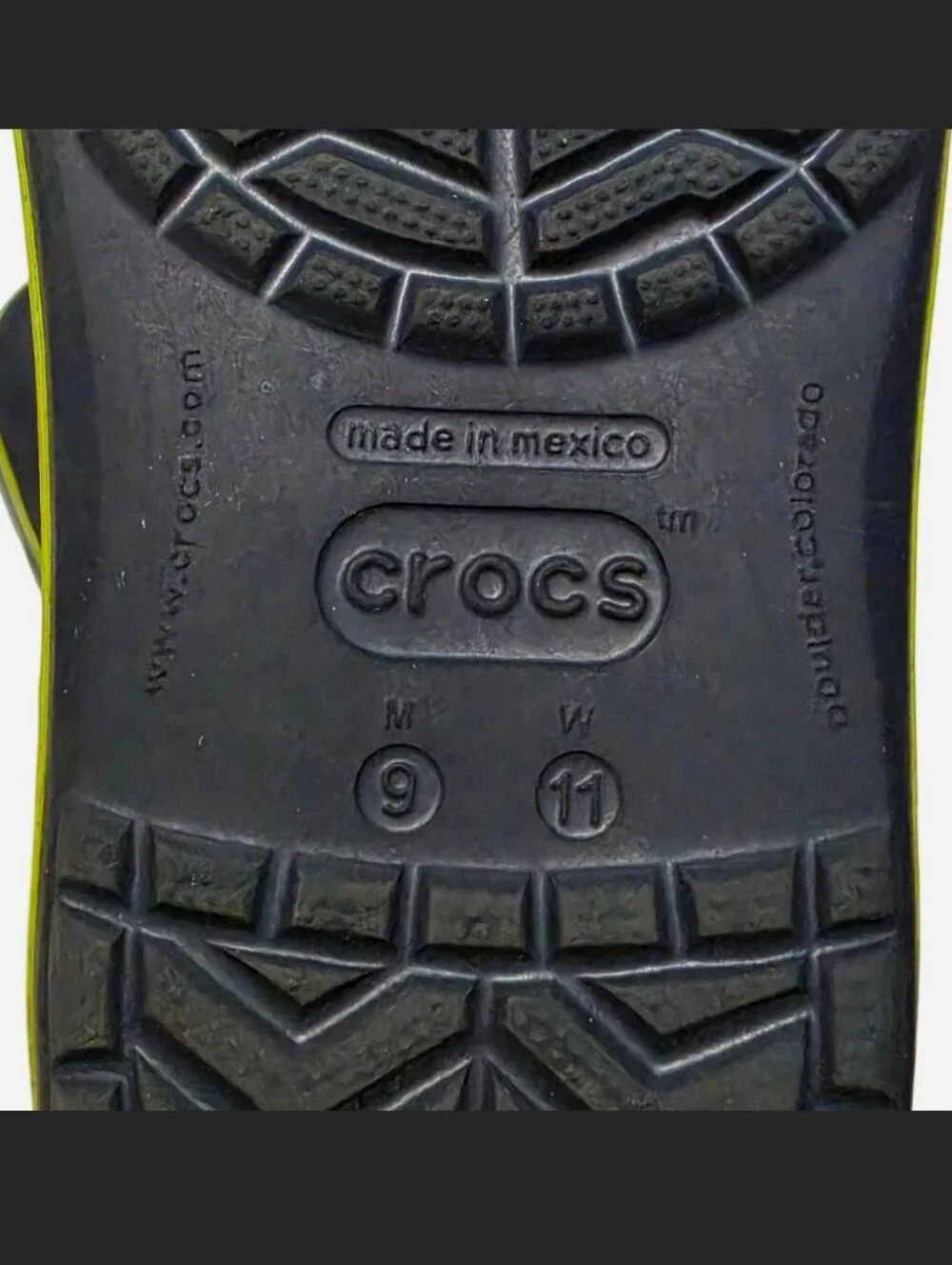 Crocs Crocband Clogs in the Navy Blue/Volt Lime Green colorway